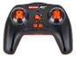 Czarny pilot Carrera RC z pomarańczowymi przyciskami i joystickami.