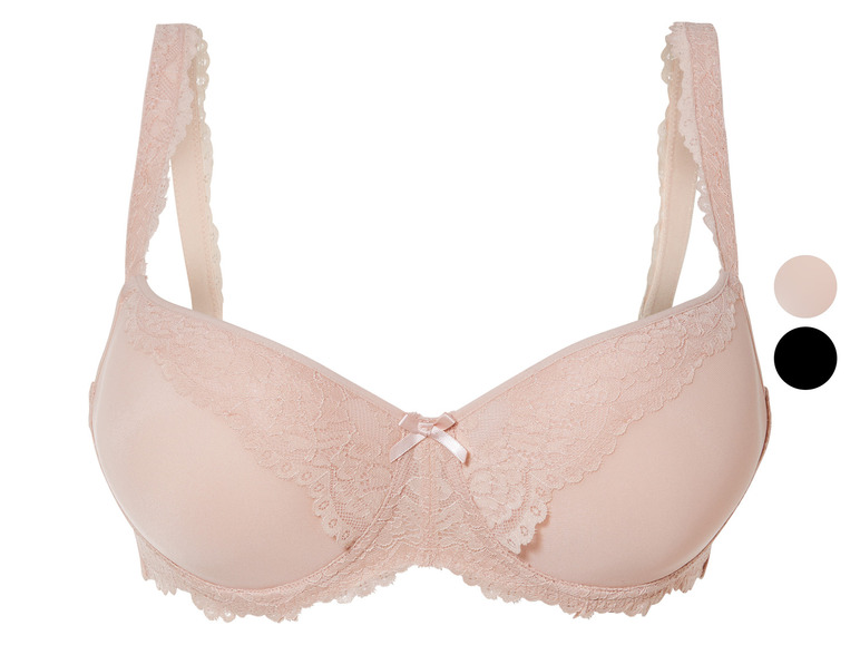 Beżowa biustonosz z koronką i kokardką.