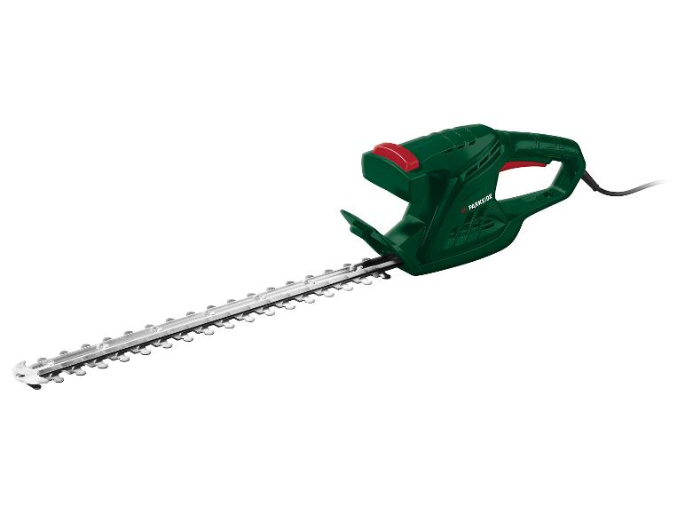 Elektryczne nożyce do żywopłotu Parkside do przycinania krzewów.