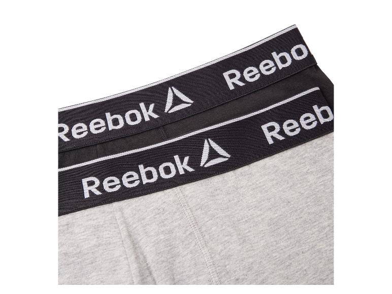Szare i czarne bokserki Reebok z logo na pasie.