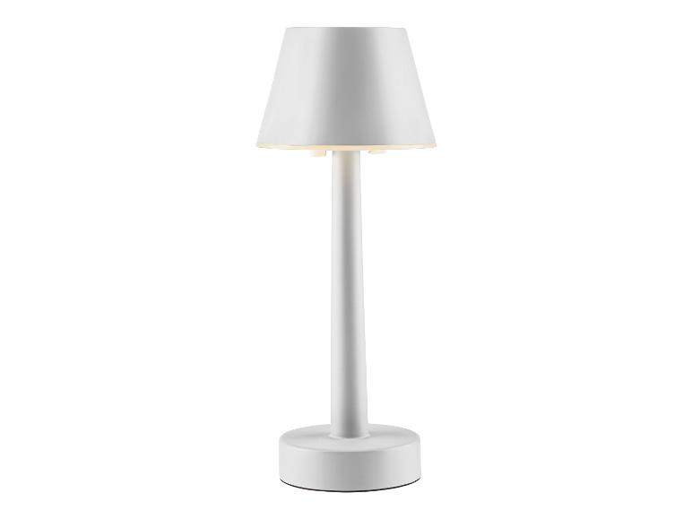 Biała lampa stołowa z okrągłym abażurem.
