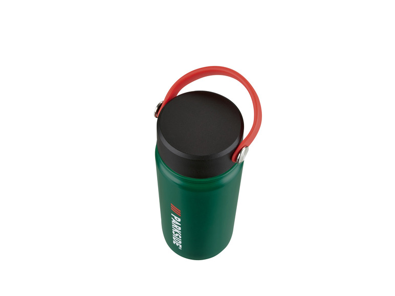 Zielona termoska Parkside z czerwonym uchwytem.