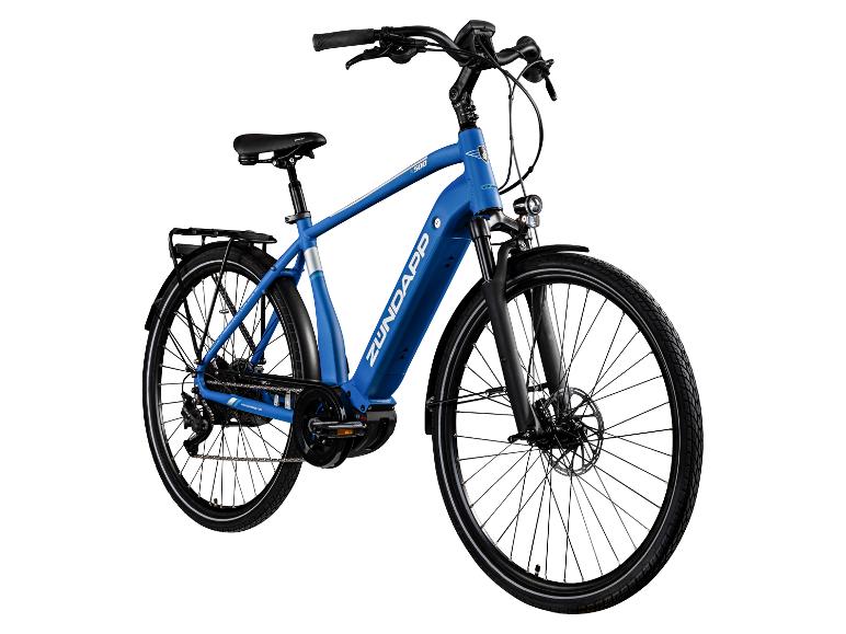 Niebieski rower elektryczny Zündapp X500 z bagażnikiem i hamulcami tarczowymi.