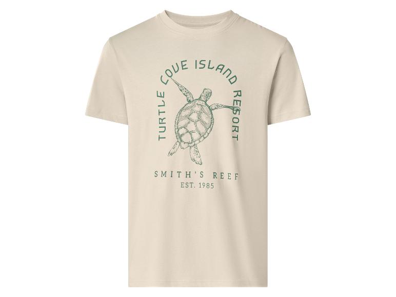 Jasnobeżowa koszulka z zieloną grafiką żółwia i napisem „TURTLE COVE ISLAND RESORT SMITH'S REEF EST. 1985”.