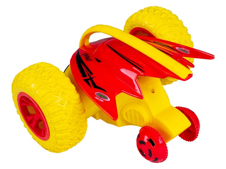 Czerwono-żółty samochód zabawkowy z dużymi, teksturowanymi kołami i górnym uchwytem.