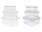 Dwa zestawy szklanych pojemników do przechowywania z pokrywkami.
