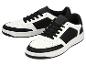 Czarno-białe sneakersy z czarnymi sznurówkami