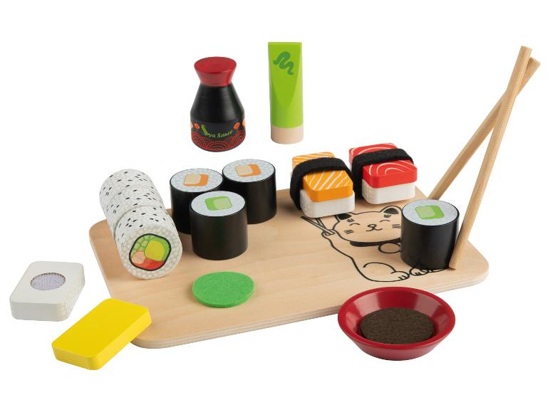 Drewniane zabawki w kształcie sushi, sosu sojowego i pałeczek.