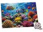Puzzle z kolorowymi rybami i koralowcami w podwodnej rafie