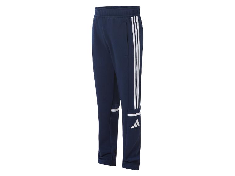 Dziecięce spodnie dresowe Adidas w granatowym kolorze z białymi paskami.