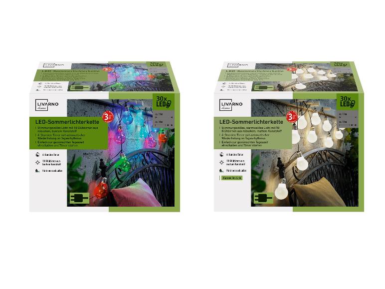 Dwa opakowania letnich łańcuchów świetlnych LED LIVARNO home, jeden z kolorowymi żarówkami, drugi z ciepłymi białymi.