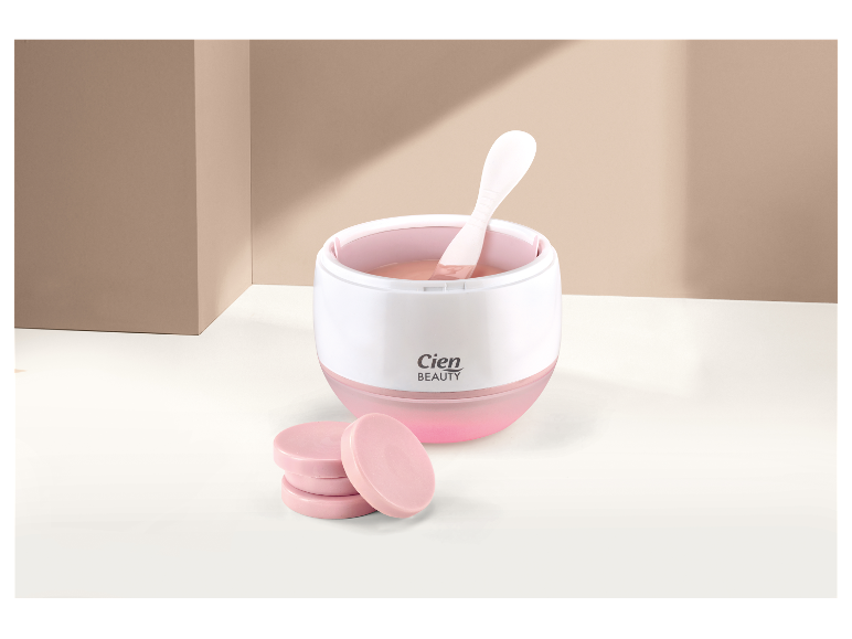Podgrzewacz do wosku Cien Beauty z woskowymi krążkami.