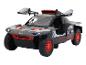 Czarny i czerwony model terenowy Audi e-tron.