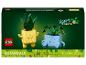 Zestaw LEGO Botanicals Happy Plants z dwoma zbudowanymi z klocków roślinami doniczkowymi z twarzami.