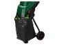 Zielony rozdrabniacz ogrodowy Parkside z czarnym workiem pełnym liści