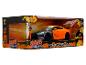 Figurki Naruto Shippuden i zabawkowy samochód 2009 Nissan GT-R (R35) w pudełku.