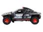 Zabawkowy model czarnego samochodu rajdowego Audi e-tron.
