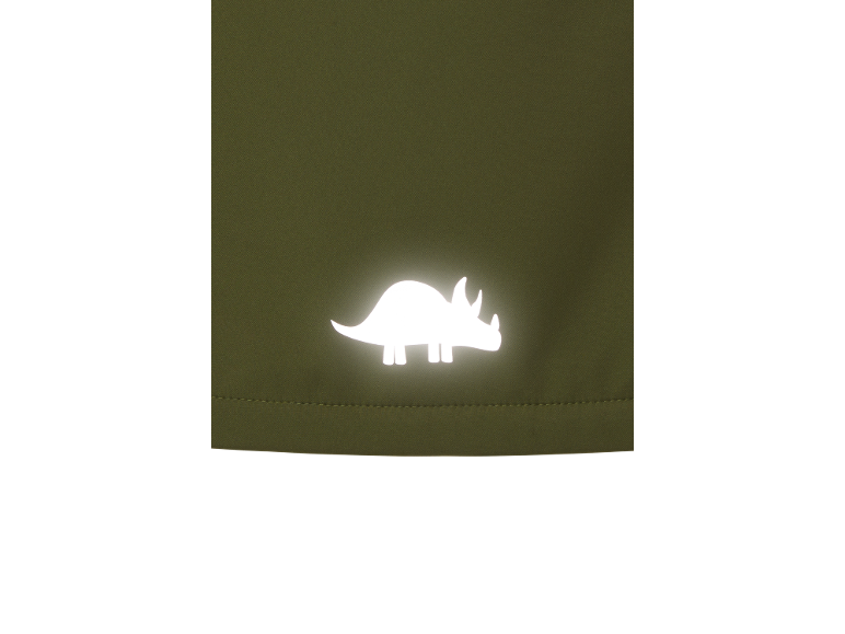 Szczegół z odblaskowym motywem dinozaura na oliwkowozielonej tkaninie.