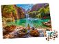 Puzzle ze stołem piknikowym obok wodospadu i turkusowego jeziora.