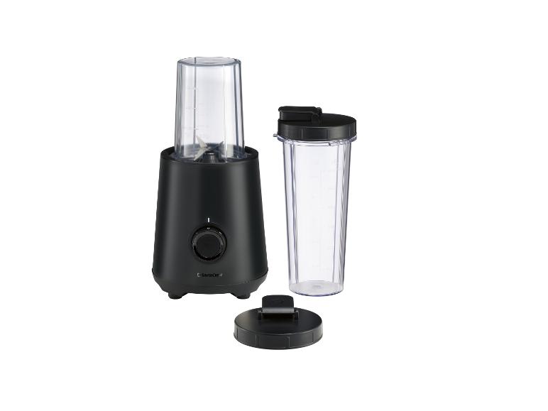 Czarny blender z przezroczystym kubkiem i pokrywką.