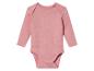 Różowy body dla niemowląt z długimi rękawami.