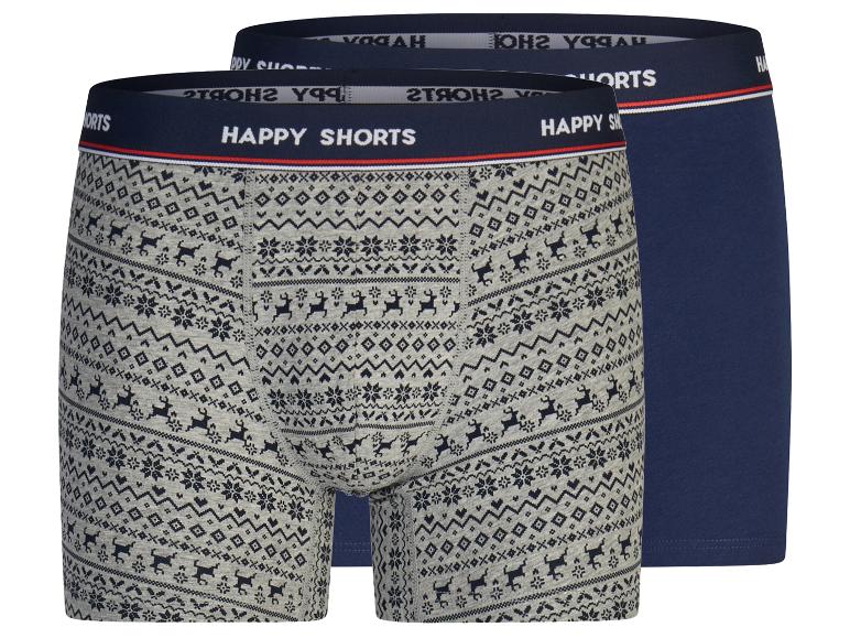 Dwie pary bokserek Happy Shorts, jedne szare we wzory reniferów, drugie jednolite granatowe.