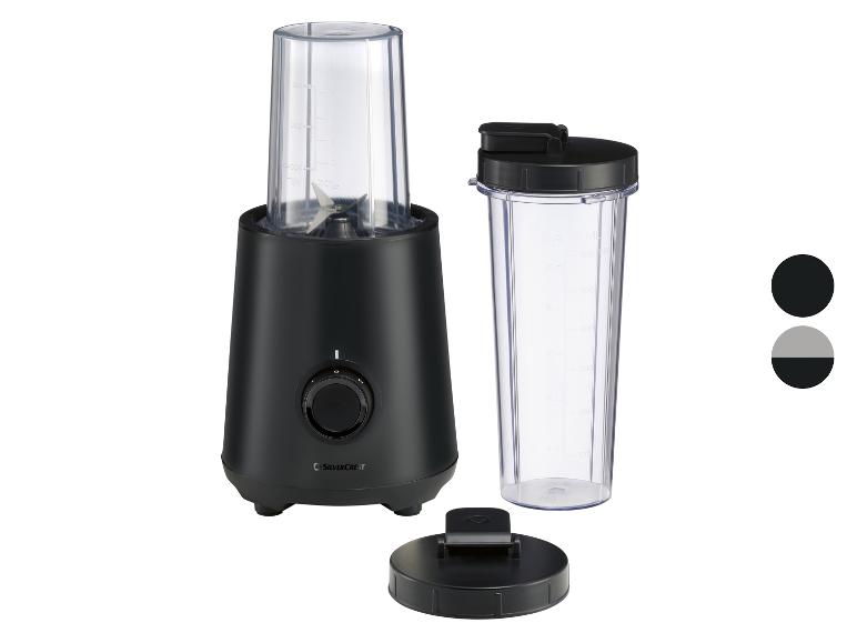 Czarny blender kielichowy z dwoma pojemnikami i pokrywkami, z pokrętłem sterującym.