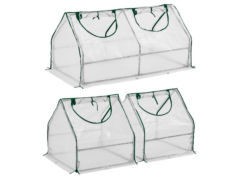 Dwa przezroczyste mini szklarnie z zielonymi obramowaniami