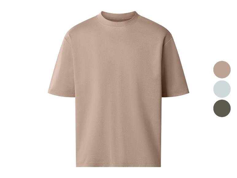 Beżowy T-shirt oversize z okrągłym dekoltem, dostępny w trzech kolorach.