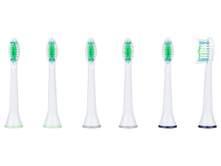 Sześć białych wymiennych główek szczoteczek do zębów z zielonym i niebieskim włosiem