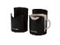 Dwa czarne uchwyty na kubki PARKSIDE, jeden z kubkiem kawy