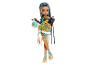 Lalka Cleo De Nile Monster High z niebieskimi włosami, złotą i turkusową sukienką oraz torebką.