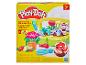 Zestaw Play-Doh 'Blooming Flowers' z 5 pojemnikami ciastoliny i akcesoriami ogrodniczymi.