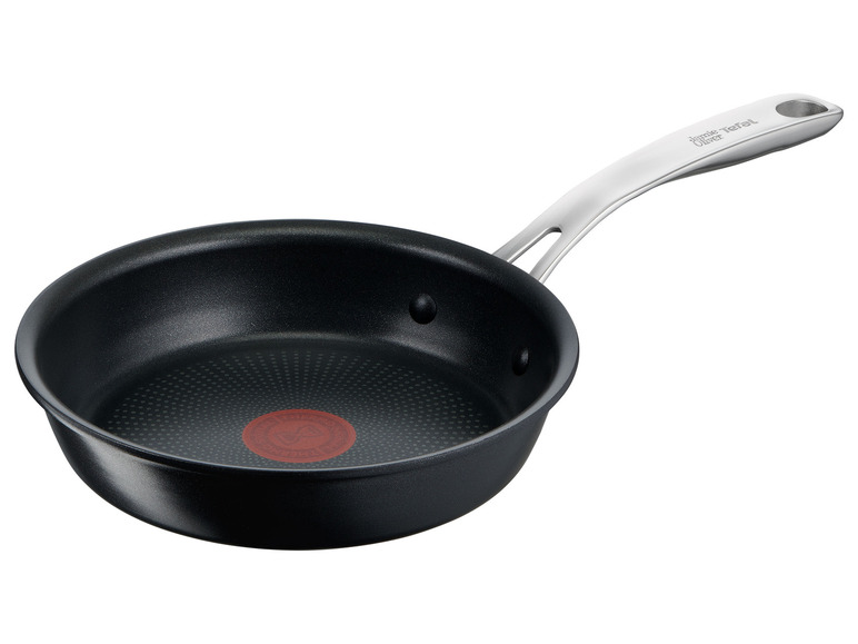 Czarna patelnia Tefal z metalową rączką.