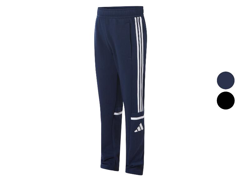 Sportowe spodnie Adidas, granatowe z białymi paskami.