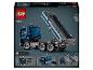 Pudełko LEGO Technic 42203 z niebiesko-szarą wywrotką z podniesioną skrzynią ładunkową.