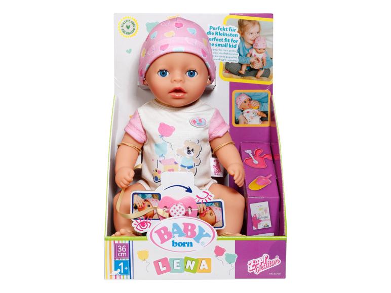 Lalka Baby Born z akcesoriami, w tym smoczkiem, w pudełku.