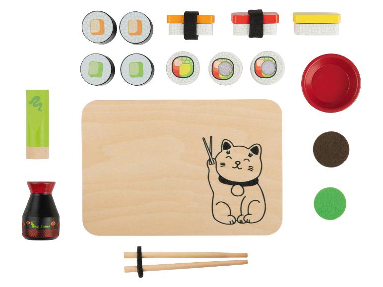 Drewniane zabawki do sushi z deską do krojenia, sosami i pałeczkami.