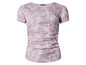 Różowy T-shirt w wężowy wzór.