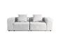 Jasnoszara modułowa sofa dwuosobowa z pasującymi poduszkami.