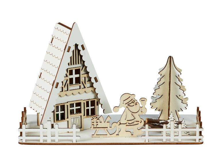 Drewniana dekoracja świąteczna z domkiem, Mikołajem i drzewami.