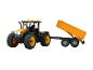 Żółty traktor z przyczepą, zabawka zdalnie sterowana.