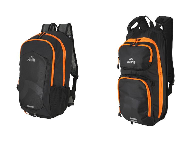 Dwa czarno-pomarańczowe plecaki Crivit, jeden z przodu i jeden z boku.