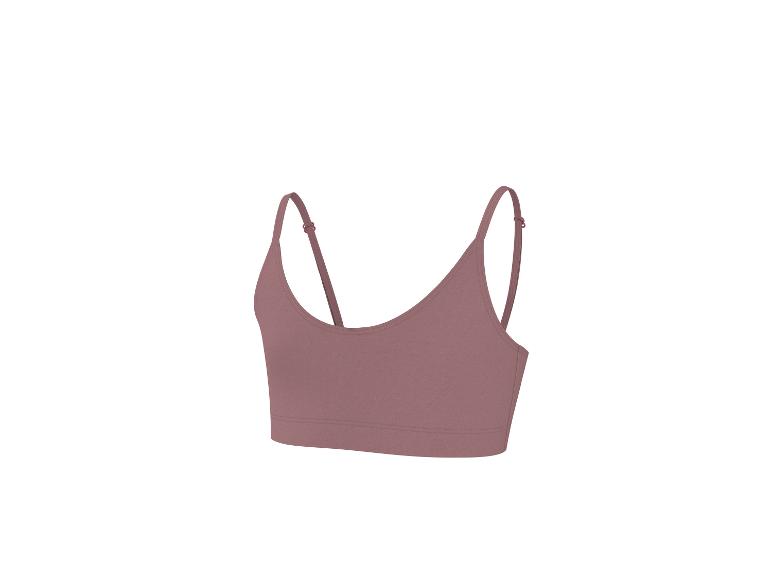 Damski sportowy crop top w kolorze mauve z cienkimi ramiączkami.