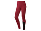 Czerwone legginsy z czarnymi detalami do ćwiczeń.
