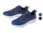 Dwa ciemnoniebieskie buty do biegania Crivit z białymi podeszwami i niebieskimi akcentami.