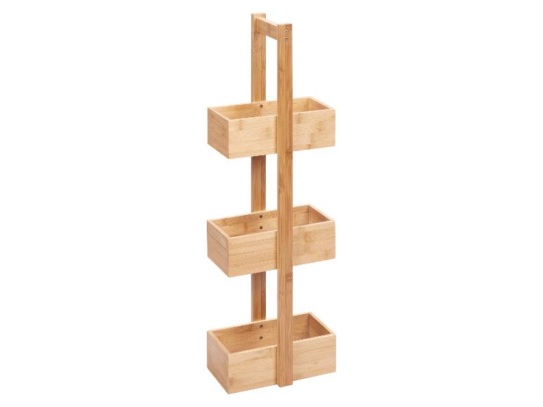 Trójkondygnacyjny stojak łazienkowy z bambusa z trzema pojemnikami.