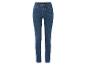 Ciemnoniebieskie jeansy skinny dla kobiet.