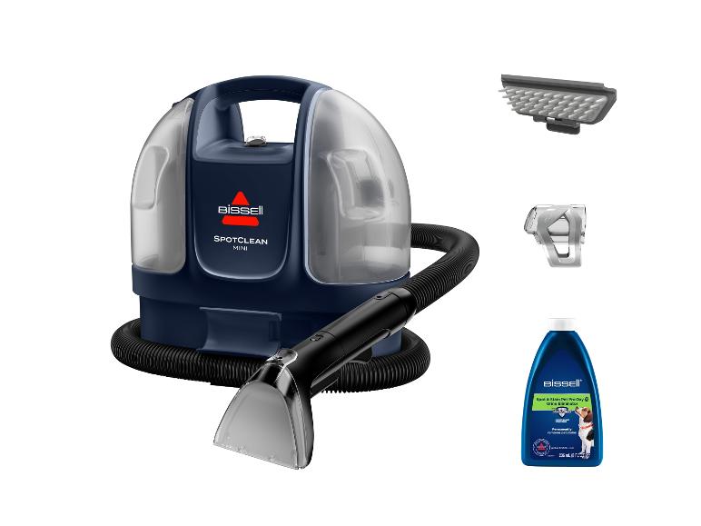 Przenośny odplamiacz BISSELL SpotClean Mini z akcesoriami i płynem czyszczącym.