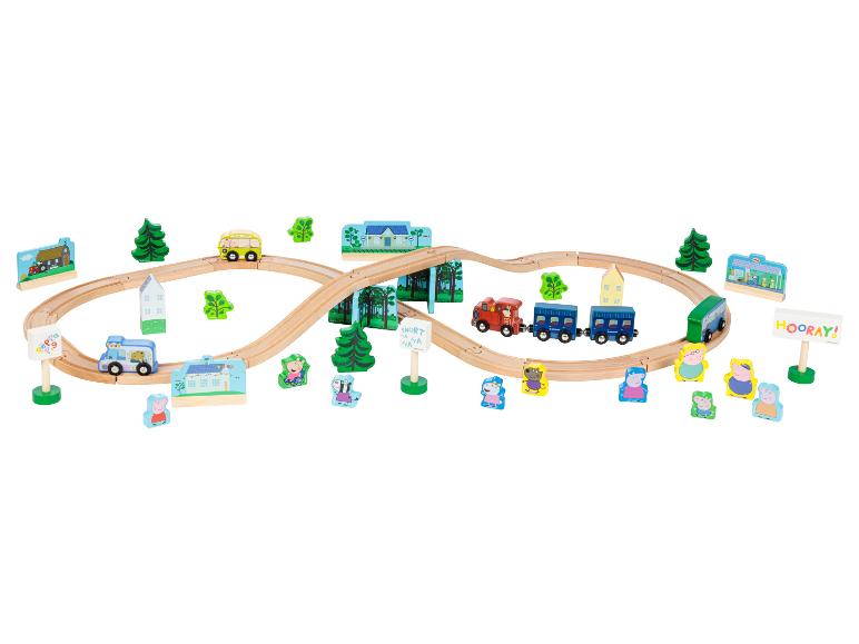 Drewniana kolejka Peppa Pig z lokomotywą, autobusami i postaciami.